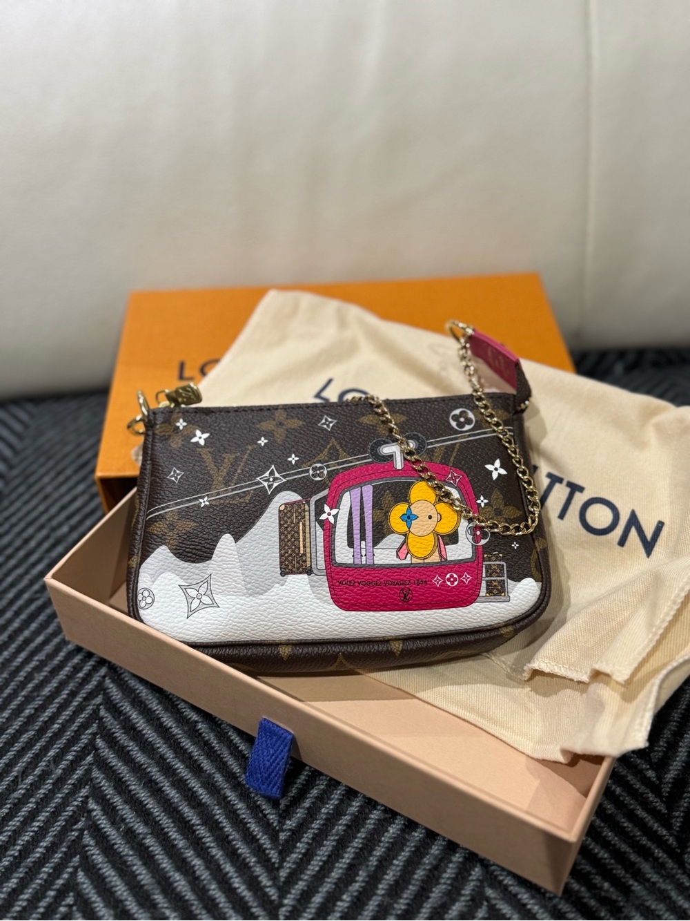 Louis Vuitton Brown Monogram Mini Bag with Pink Cable Car Motif